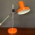 Stylish vintage orange desk lamp. Netherlands. There are traces of time. 1950s Height adjustable to 19.6 inc (50 cm)....