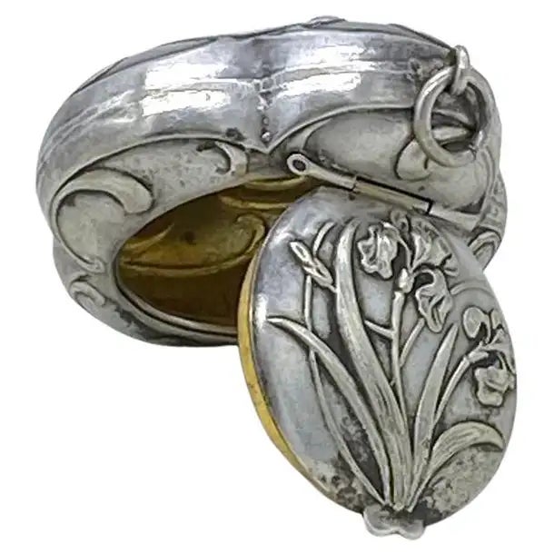 This is an antique Art Nouveau style silver chatelaine box. It comes from Austria and has gilt inside the silver box with...