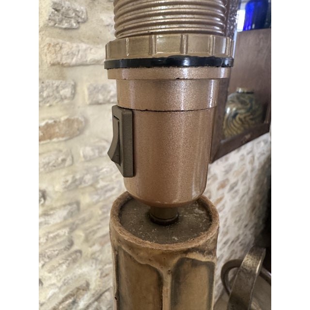Hammered metal and leather floor lamp, brutalist style, by Jean-Pierre Rickaert, French master metalworker and designer....
