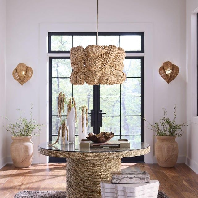 Handcrafted from natural mango wood beads and antique brass, this artisan chandelier adds texture, warmth, and a sense of...