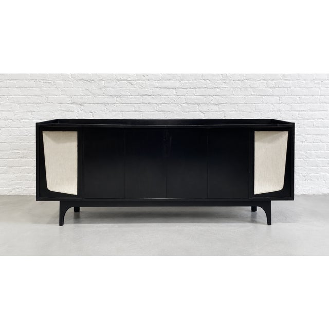 This extra long Mid Century Modern stereo cabinet, custom-made in the 1960s and inspired by the iconic designs of Gio...