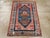 This early 20th century Turkish Anatolian rug, measuring 3' 1" x 4' 7", showcases a bold geometric medallion design...