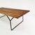 The Model 400 coffee table, designed by Harry Bertoia for Knoll International in the 1950s, is characterized by a...