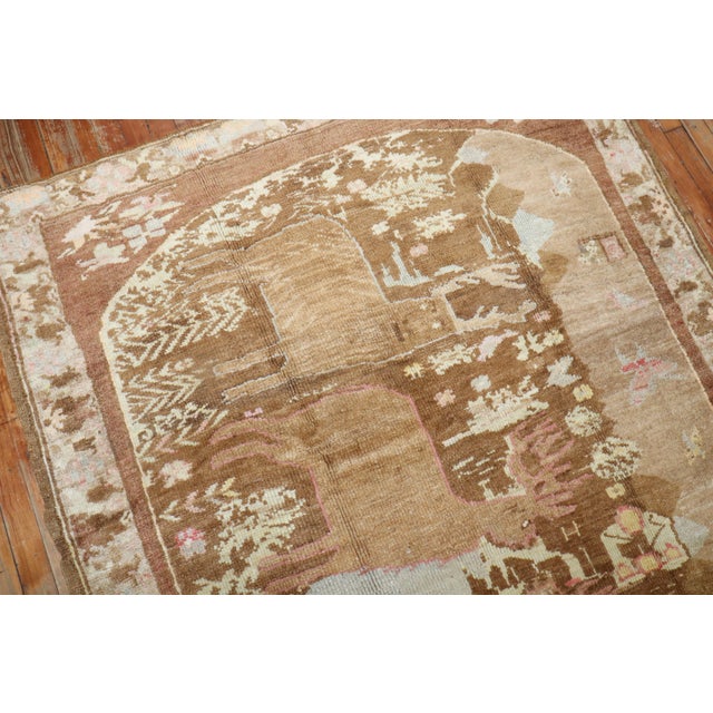Mid-20th Century Turkish Pictorial Rug depicting 4 deers predominantly in brown 5' x 7'9''