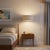 Crafted with satin nickel and a turquoise linen shade, the Stretch Swag Kit is a modern lighting solution by the NOVA...