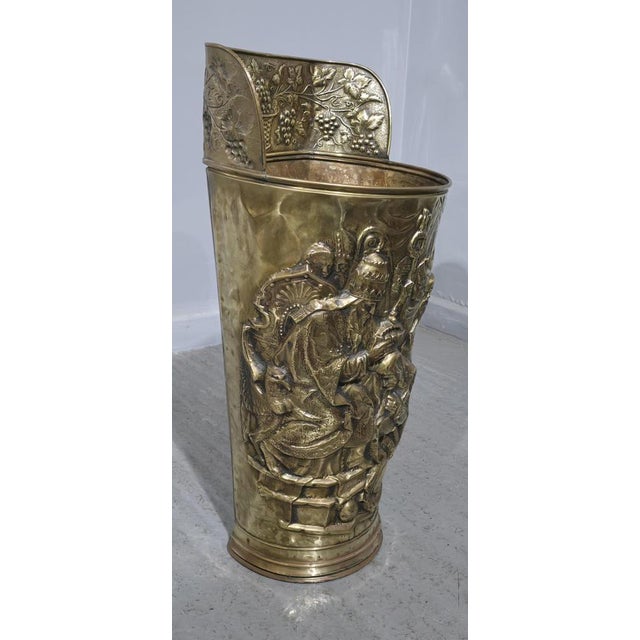 A super quality Victorian brass repousse stick stand, in excellent condition throughout. 28.5" high 14" wide 12" depth