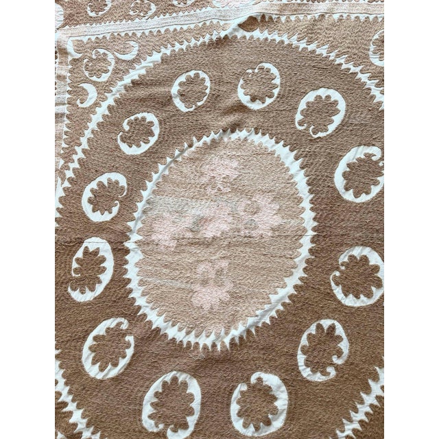 Decorative Vintage Suzani from Uzbekistan, circa mid-1960s. There is a hole on this suzani. Dimension; 60'' x 61'' inches...