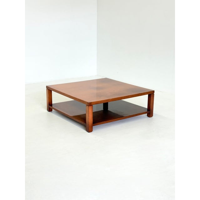 This square coffee table by Hugues Chevalier belongs to the same Dominique series as the matching sofa. The table is made...