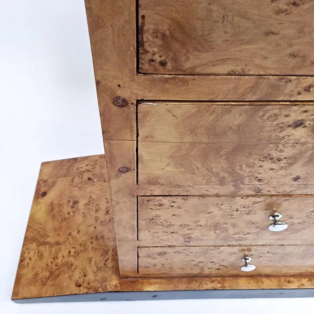 Burl wood sideboard/credenza. This beautiful piece is built with materials such as burl wood veneer and black lacquered...