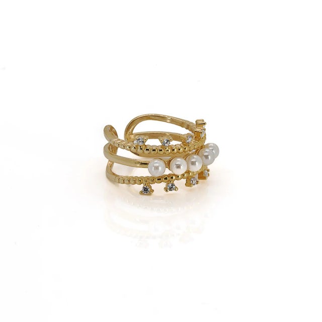 Elegance, modernity, and a touch of sparkle come together in the Cleopatra Pearl & Diamond Gold Adjustable Ring Its...