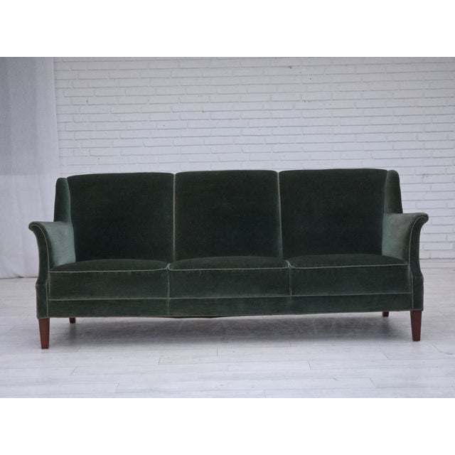 1960s, Danish 3-seater sofa. Original turquoise-green furniture velour, teak wood legs, brass springs in the seat....