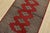 A tribal Bokhara Jaldar rug hand-knotted with fine wool on a cotton foundation. This rug features geometric medallions set...