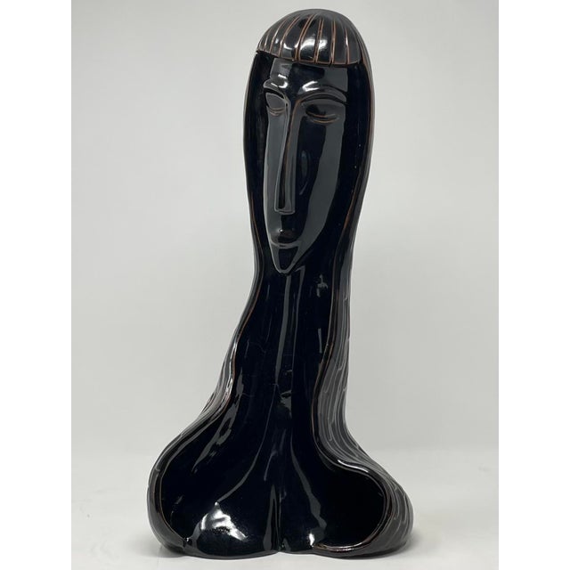 Fantastic Mid 20th Century TÊTE DE FEMME deep chocolate brown glazed clay sculpture. This interesting figurative sculpture...