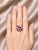 Stunning 18K white gold designer ring featuring 6 natural marquise pink tourmalines and 14 brilliant round diamonds...