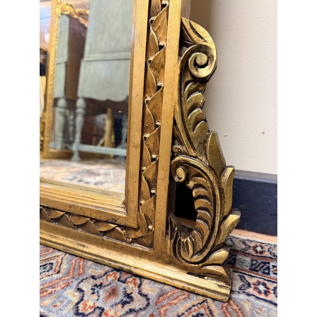 Beautiful French style carved gilt wood mirror with elegant detailing and a classic decorative frame. The rich gilt finish...
