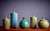 Tom McMillin Ceramic Vessels with lid and Vase in green, USA 1960s. The measurements given apply to the tallest vessel....
