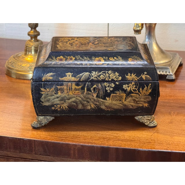 Chinoiserie box with hand-painted garden and pavilion scenes on all sides, including floral borders and a central...
