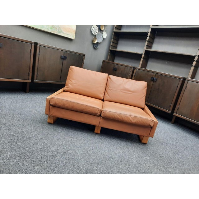 Beautiful COR sofa by Friedrich Wilhelm Möller. The design was introduced in 1964. Original condition featuring light...