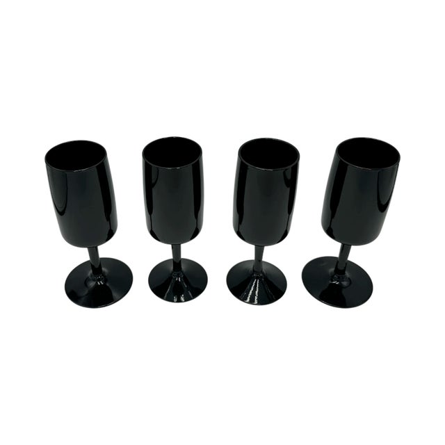 Details: -A striking set of 4 vintage mid-century black cocktail glasses -Elegant stemmed form with deep black finish...