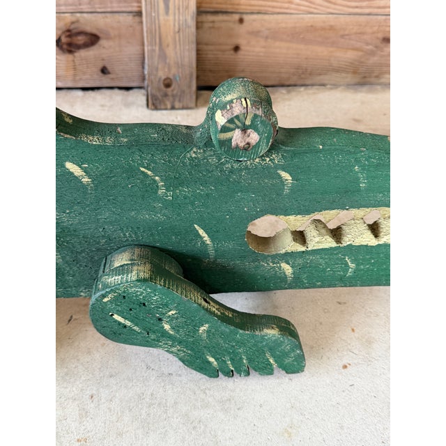 Big. Bold. Wonderfully weird. This monumental vintage carved wooden alligator is pure Florida folk art with just the right...