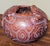 A handcrafted ceramic pot by Brazilian artist Reis Pará, created in the traditional Marajoara style of Marajó Island. The...