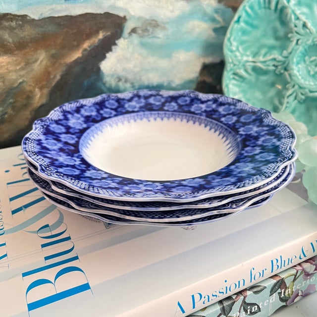 Beautiful set of antique Flow Blue soup bowls can be used as dinnerware or an instant plate wall. The bowls in the "Grace"...
