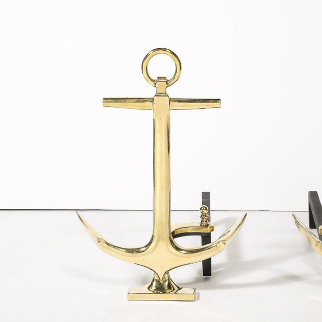 This gleaming Pair of Mid-Century Modernist Anchor Andirons in Polished Brass originates from the United States, Circa...