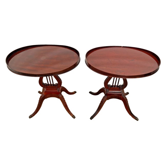 Add a touch of classical elegance to your space with this stunning pair of vintage accent tables by Mersman (Model 6651,...