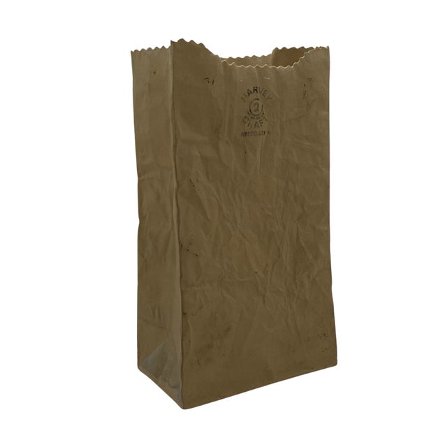 An iconic "Paper Bag" ceramic vase designed by Canadian ceramic artist Michael Harvey for the Crinkle Craft Collection....