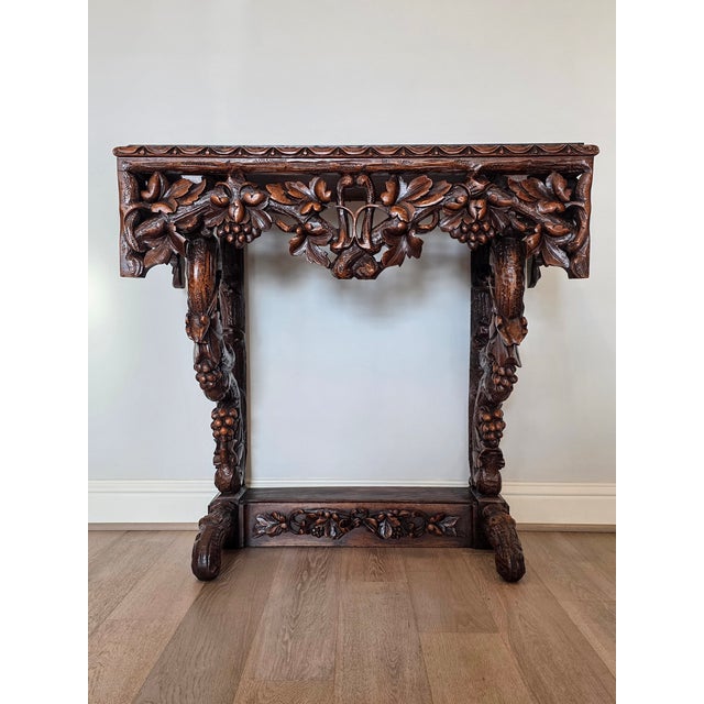 An extraordinarily carved Black Forest console table. 19th century, Continental Europe, most likely German, Swiss or...