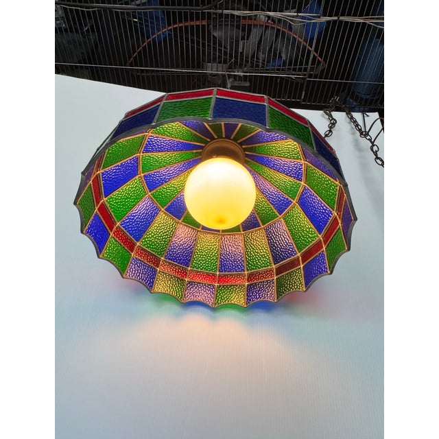 Amazing vintage hanging stained glass lamp with blue emerald green & crimson red glass please look at pictures for overall...