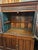 Vintage Large Two-Part Wooden Glass-Front Cabinet With Paneled Base and Carved Detail For Sale - Image 10 of 12