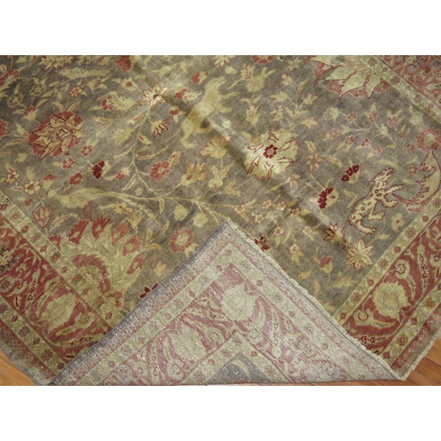 Accent size pictorial Turkish Sivas carpet from the first quarter of the 20th century. The gray field with a flurry of...