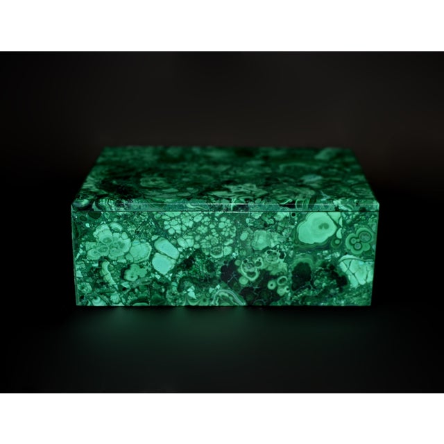 A substantial, jumbo size, hand‑crafted malachite box made from genuine stone, prized for its extra‑large size, measuring...