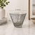 This mid-century hand-blown art glass bowl showcases a sculptural optic bubble pattern created through controlled air...