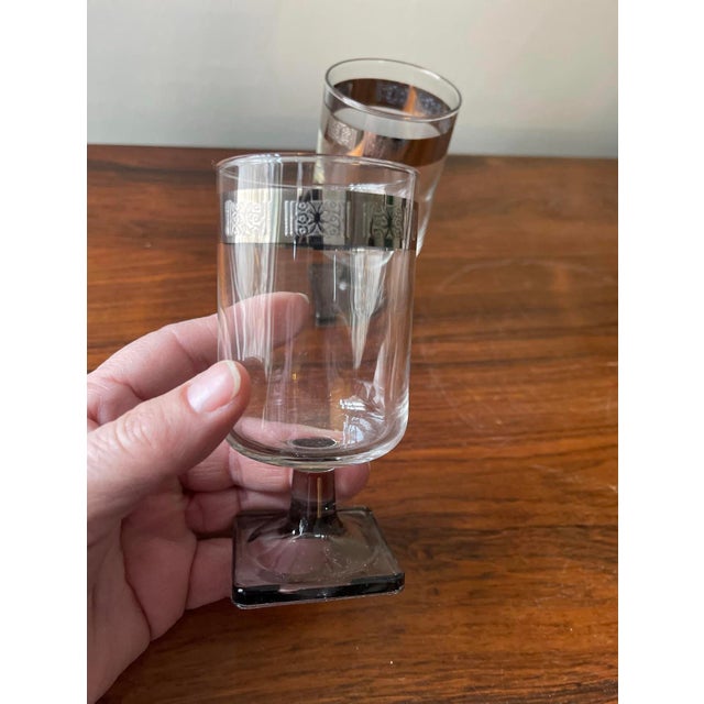 Wonderful pair of mid-century German barware, called the linear, smoke pattern, it presents on a light, gray short stem...