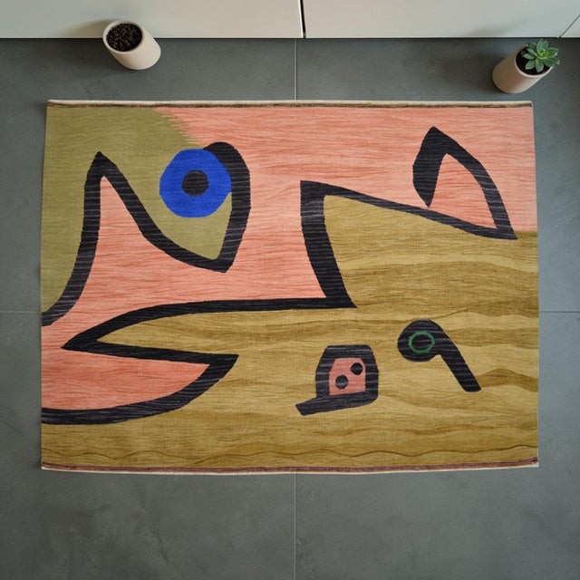 Adapted from Paul Klee's "Silence of Angels," this handmade Oushak flat weave kilim is a one-of-a-kind textile artwork...