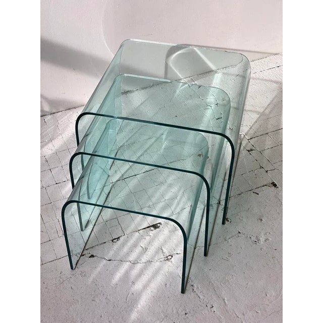 Glass Waterfall Nesting Tables Attributed to Angelo Cortesi for FIAM Italia, Set of 3, Circa 1980s. Arched design with...