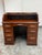 Design Plus Gallery presents a Victorian Lebus Manner Oak Roll Top Desk. It has a traditional paneled construction and a...
