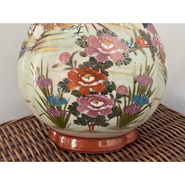 A vintage 1980s Japanese export Satsuma-style vase, hand-painted with beautiful pheasants, peonies, and cherry blossoms...