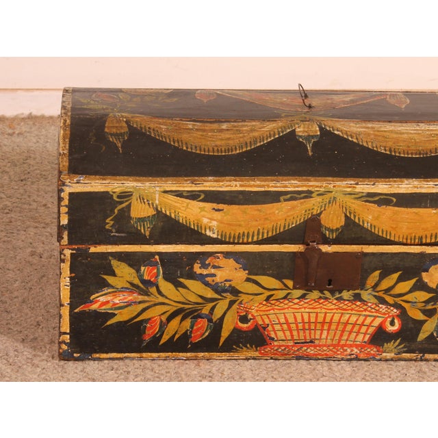 Beautiful painted beechwood wedding chest with a rich decoration of foliage, flowers, garlands, and a basket in its...