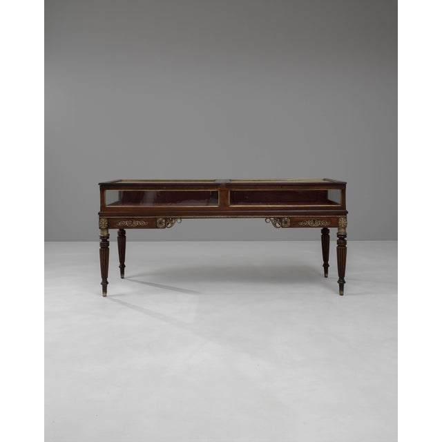 This stunning early 1900s Spanish wooden shop counter is a splendid example of craftsmanship and ornate design, bringing...