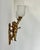 Pair of wall sconces with a gilt metal frame, produced in Italy in the 1950s. Classic design that has stood the test of...