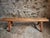 This authentic antique wooden bench dates to the early 1900s and features a beautifully timeworn patina, showcasing...