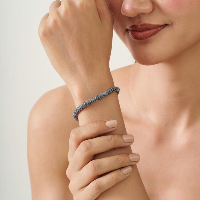 Classic, refined, and effortlessly elegant, this natural blue sapphire beaded bracelet brings timeless sophistication to...