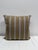 Decorative pillow with X mitered cut stripe reversible to vertical stripe. Down filled insert