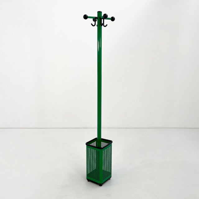 Green Perforated Coat Rack and Umbrella Stand from Neolt, 1980s, in Good conditions. Designed 1980 to 1989 This piece has...