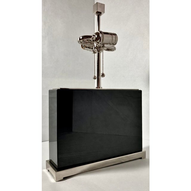 The Williams Sonoma Wide Black Crystal Block Table Lamp is crafted from solid black crystal and finished with a...