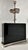 The Williams Sonoma Wide Black Crystal Block Table Lamp is crafted from solid black crystal and finished with a...