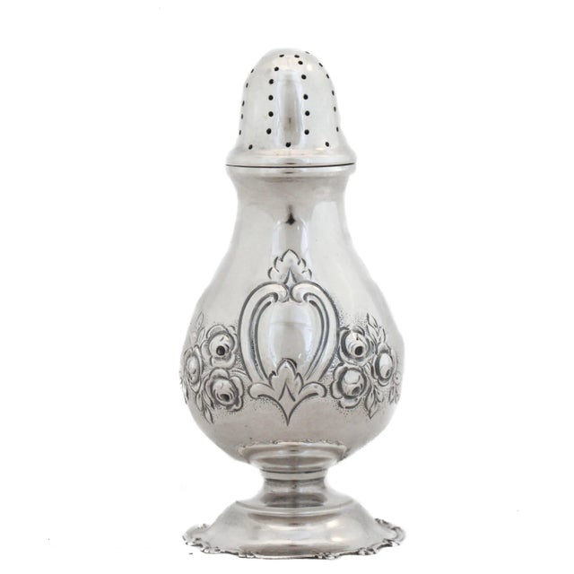 We are delighted to offer you this set of four sterling silver salt shakers. Manufactured in the Austrian-German Empire in...
